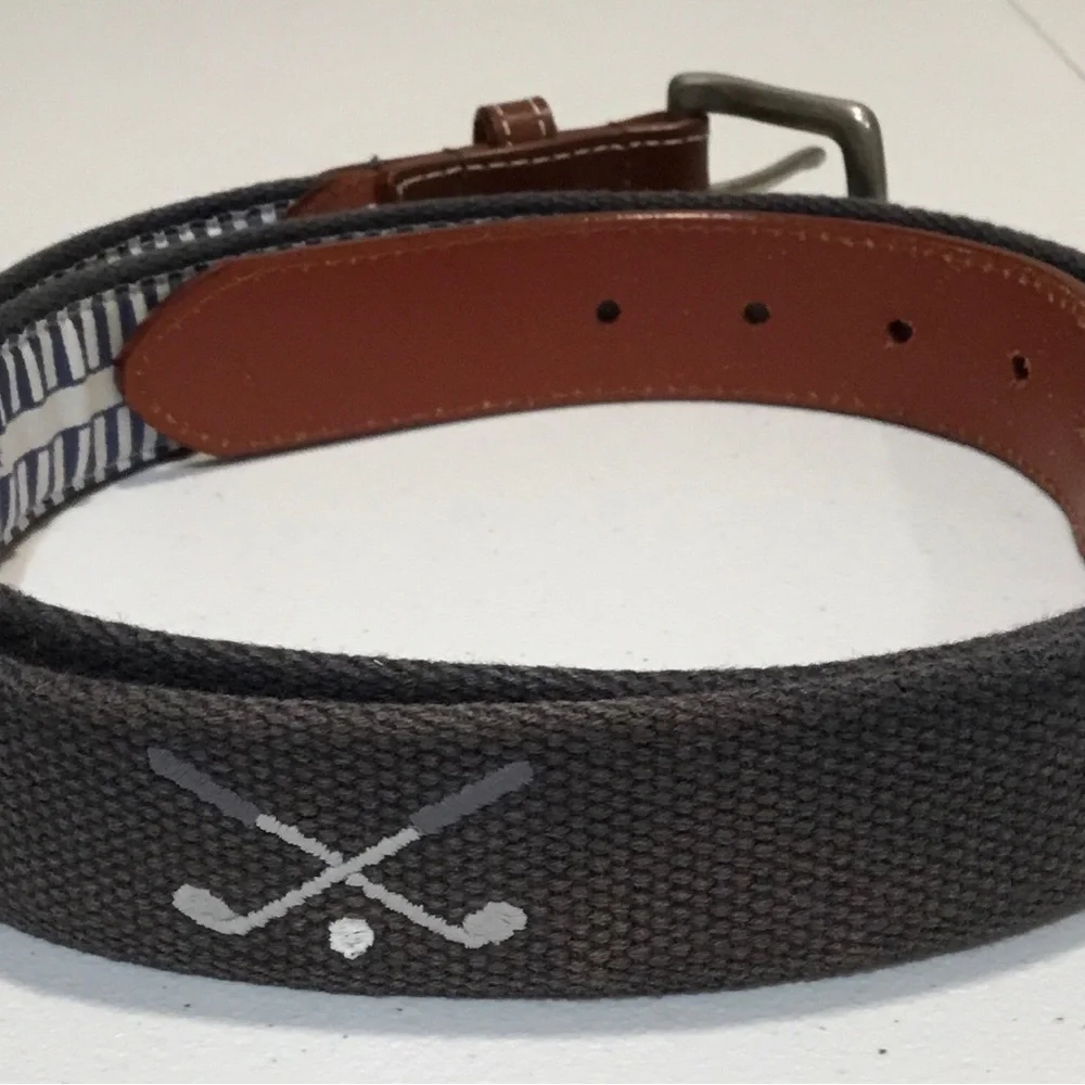 Men's Grey Woven Belt  with Golf Clubs and has Brown Leather Trim